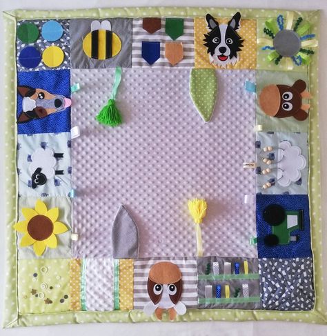 A custom designed tummy time play mat with farm elements Diy Sensory Play Mat, Tummy Time Blanket Diy Play Mats, Tummy Time Quilt Pattern, Sew Play Mat, Tummy Time Play Mat, Diy Tummy Time Activities, Diy Tummy Time Mat, Baby Play Mat Diy Sewing, Baby Playmat Quilt