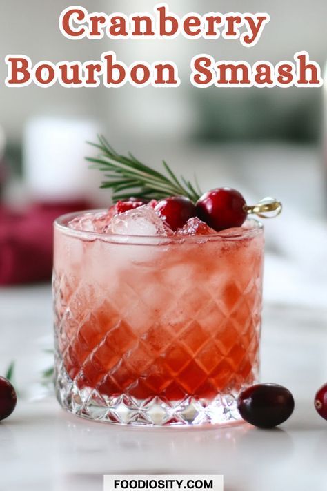 Looking for a cocktail with bold flavors and seasonal flair? This Cranberry Bourbon Smash combines the tartness of cranberries with the richness of bourbon, creating the perfect drink for fall or holiday gatherings. Whether you're hosting a party or enjoying a cozy night in, this cocktail is a must-try. Click to get the easy recipe and add a festive twist to your drink menu! Holiday Cocktail Whiskey, Whiskey Drinks Simple, Cranberry Syrup, Festive Holiday Cocktails, Whiskey Smash, Bourbon Smash, Fall Cocktail, Cocktail Syrups, Cozy Drinks