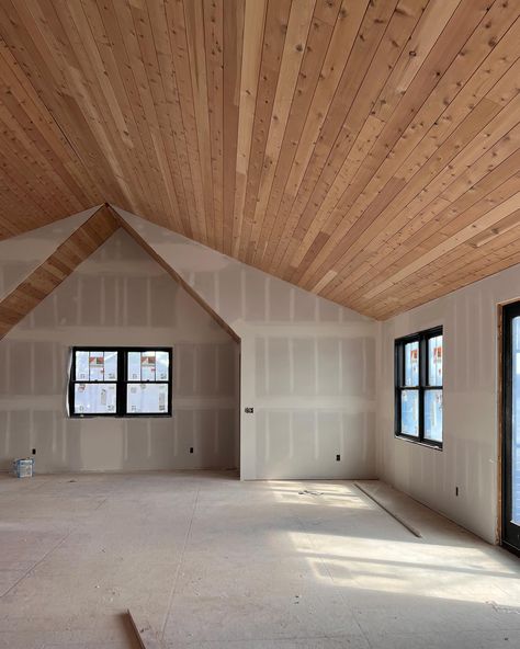 WOOD CEILING TRANSFORMATION. We had big dreams of a beautiful natural wood ceiling in the guest house but when we saw the red/orange ceiling we felt defeated. After considering our options of staining or painting we had a few samples boards made and found the perfect solution. Scroll all the way to the end for photos of the products used to achieve the lighter more natural looking wood. #woodceiling #guesthouses #vaultedceiling #naturalwood #modernrustic #rusticmodern Wood Ceilings Concrete Floors, Vaulted Wood Plank Ceiling Living Room, Wood Paneled Vaulted Ceiling, Wood Ceilings Vaulted, Wood Floors And Ceilings, Wood Slanted Ceiling, Vaulted Ceiling Wood Paneling, Wooden Vaulted Ceiling Living Room, Tongue And Groove Vaulted Ceiling Living Rooms