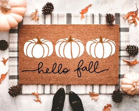 Bring on the pumpkins spice and everything nice!🎃✨ 🍁🍂 Here are just a few of our cozy fall doormats to welcome the season! Who’s ready for some fall decorating? 🎃 ✨ Check out more designs and porch decor available now on our Etsy shop! 🛍️ #doormats #doormatsofinstagram #falldecoratingideas #fallporchdecor #fall2024 #falldecorinspo #fallhomedecor #daddydaughterdeco #customdoormat Fall Front Door Rug, Fall Welcome Mat Ideas, Fall Mats Diy, Painted Door Mat Diy Fall, Diy Fall Rug, Fall Rugs Outdoor Diy, Fall Diy Doormat, Fall Door Mats Diy, Diy Fall Doormat