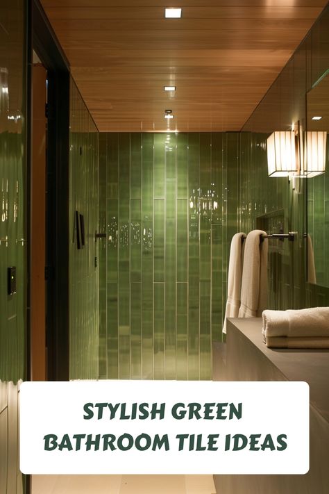 Modern bathroom showcasing glossy green tiles with wood accents and elegant lighting fixtures. Wood And Green Bathroom Ideas, Green Bath Tile Ideas, Green Bathrooms Aesthetic, Green And Chrome Bathroom, Green Vertical Tile Bathroom, Light Green Tile Bathroom, Green Subway Tile Bathroom, Green Tile Bathroom Floor, Green And Black Bathroom