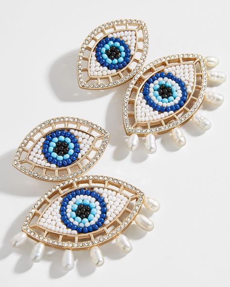 Karen B Wolf Interiors on Instagram: “Classic evil eye motifs get a revamp thanks to stunning mixed media motifs 👁️ Intricately arranged seed beads form the main evil eyes, and…” Evil Eye Jewelry Bracelet, Protection Charms, Beaded Eye, Shrinky Dink Earrings, Product Shoot, Evil Eyes, Evil Eye Earrings, Evil Eye Ring, Animal Embroidery