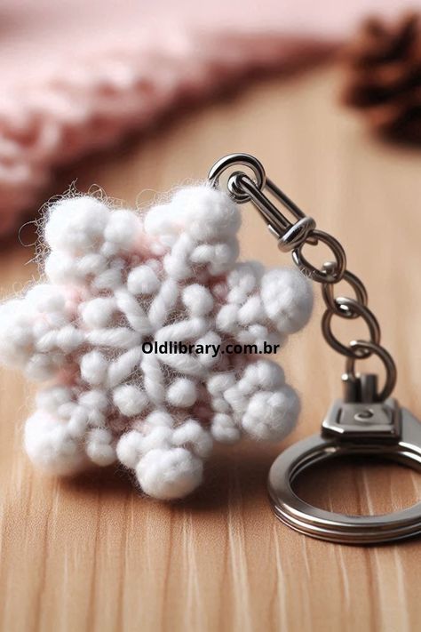 Crochet a stunning snowflake keychain with this easy pattern. Perfect for winter gifts and seasonal decorations! Crochet Winter Keychain, Snowflake Keychain, Crochet Snowflake, Amigurumi Animals, Winter Gifts, Crochet Snowflakes, Crochet Bookmarks, Snow Flake, Seasonal Decorations