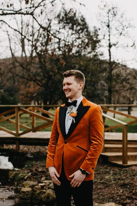 Fall Groom Attire Burnt Orange, Burnt Orange Suit Wedding, Black Burnt Orange Wedding, Groom Burnt Orange, Wedding Suits Groom Burnt Orange, Burnt Orange Groom Suit, Orange Groomsmen Attire, Black Suit Burnt Orange Tie, Black Suit Orange Tie Groomsmen