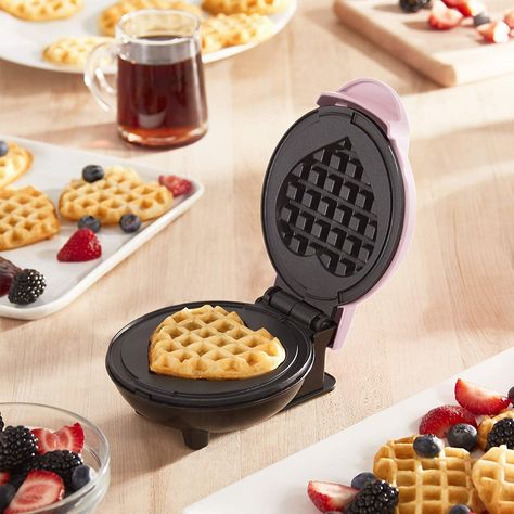 A teensy mini waffle maker that will churn out adorably-sized, perfectly cooked-through waffles in mere minutes — the ultimate birthday treat. Heart Shaped Waffle Maker, Mini Waffle Maker, Waffles Maker, Best Valentine's Day Gifts, Hash Browns, Waffle Iron, Waffle Maker, Tiny Kitchen, Ice Cream Maker