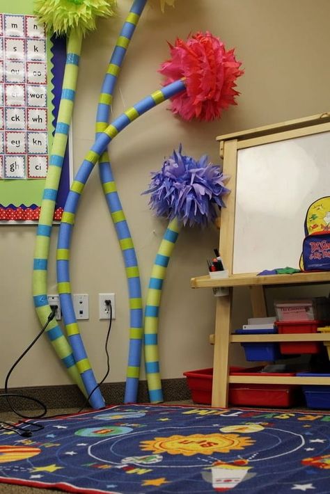 Find this and other ideas for an incredible Doctor Seuss-themed classroom at Tangled With Teaching. Dr Seuss Classroom Theme, Lorax Trees, Teaching Theme, Dr Seuss Classroom, Truffula Trees, Seuss Classroom, Samantha Smith, Dr. Seuss, Tissue Pom Poms