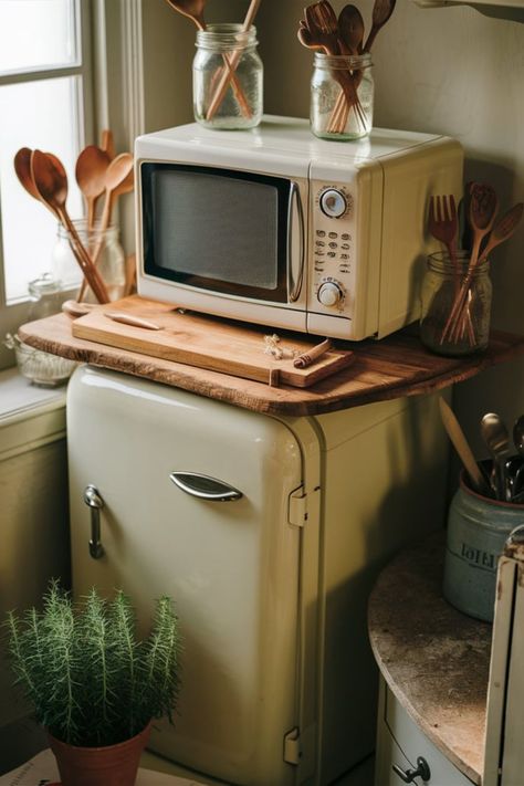 Mini fridge with microwave on top, creating an efficient and stylish kitchen solution for small spaces. Where To Put The Microwave, On Top Of Fridge, Top Of Fridge, Compact Kitchens, Small Fridge, Mini Refrigerator, Small Fridges, Compact Kitchen, Studio Apartments