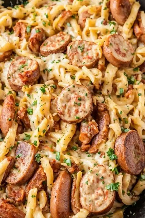 RecipesMoms.Com Smoked Sausage Cajun Alfredo, Cajun Sausage Recipe, Cajun Alfredo Recipe, Sausage Pasta Dinner, Smoked Sausage Recipes Pasta, Sausage Alfredo Pasta, Cajun Alfredo, Cajun Sausage Pasta, Easy Sausage Recipes