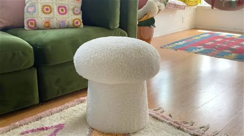 This DIY Mushroom Ottoman Isn't Just Cute, It's Functional Too How To Make A Mushroom Stool, Mushroom Ottoman Diy, Mushroom Pillow Diy, Diy Mushroom Stool, Mushroom Living Room, Storage Ottoman Diy, Diy Ottoman Ideas, Mushroom Footstool, Mushroom Ottoman