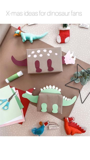 Dino Gift Wrapping Ideas, Dinosaur Stocking Christmas, Dino Gifts For Adults, Dinosaur Christmas Decorations Diy, Dinosaur Wrapping Ideas, Cool Wrapping Ideas Birthday, Christmas Dinosaur Craft, Dinosaur Themed Gifts, Dinosaur Birthday Gifts Ideas