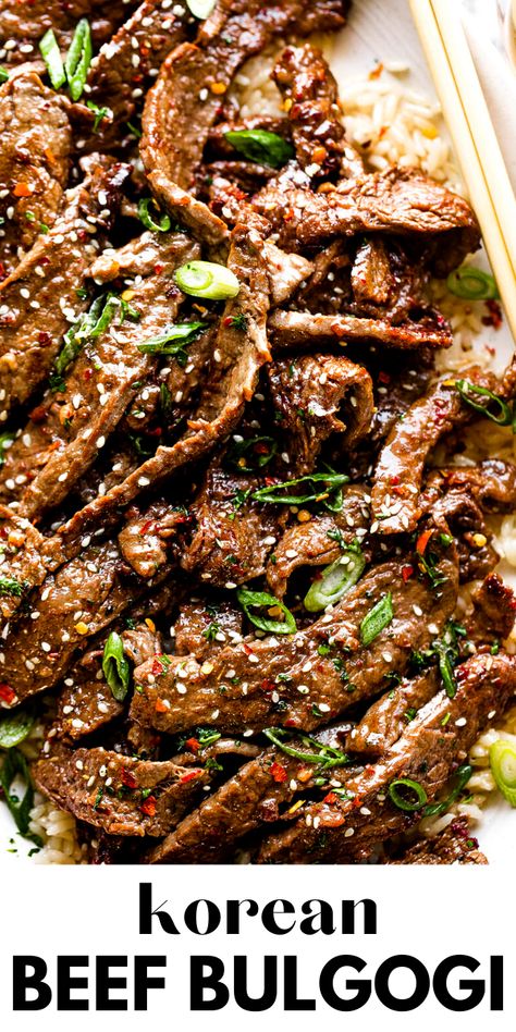 Tender slices of flank steak are marinated with fresh pear, ginger, garlic and soy sauce in this amazing Korean Beef Bulgogi! You’ll love the sweet heat of the gochugaru spice and the smoothness of the warm, nutty sesame oil. Korean Beef Bulgogi Flank Steak, Steak Bulgogi Recipe, Sliced Beef Strip Recipes, Korean Skirt Steak, Simmering Steak Recipes, Flank Steak Asian Recipes, Sliced Flank Steak Recipes, Korean Steak Marinade, Easy Flank Steak Recipes