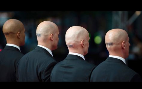 Security members display their barcode tattoos during the world premiere of 'Hitman: Agent 47' in Berlin, Germany Agent 47 Tattoo, Hitman Tattoo, Hitman Agent 47, Barcode Tattoo, Rupert Friend, Agent 47, Space Suits, Zachary Quinto, Vampire Diaries Funny