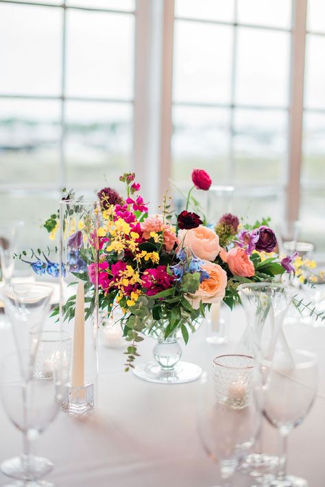 Colourful Floral Table Arrangements, Colorful Summer Wedding Centerpieces, Colorful Wedding Arrangements, Summer Wedding Keeping Cool, Colourful Centerpieces Wedding, Vibrant Floral Centerpieces, Round Table Centerpieces Wedding Colorful, Wildflower Long Table Centerpiece, Colorful Wedding Centerpieces Bright