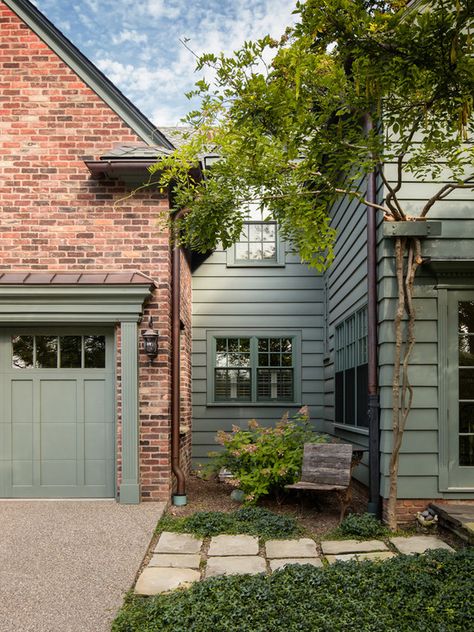 Green siding with red brick is a beautiful pairing of color and texture for a home's exterior. Red Brick House Exterior, Green Siding, Brick Siding, Orange Brick, House Trim, Siding Colors, Pintura Exterior, Exterior Paint Color, Red Brick House