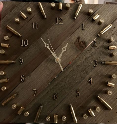 Do it yourself shell casing clock! Diy Shell Casing Crafts, Wood Clock Ideas, Diy Wall Clock Ideas, Shell Casings Crafts, Wall Clock Ideas, Bullet Casing Crafts, Shotgun Shell Crafts, Diy Wood Crafts, Bullet Crafts