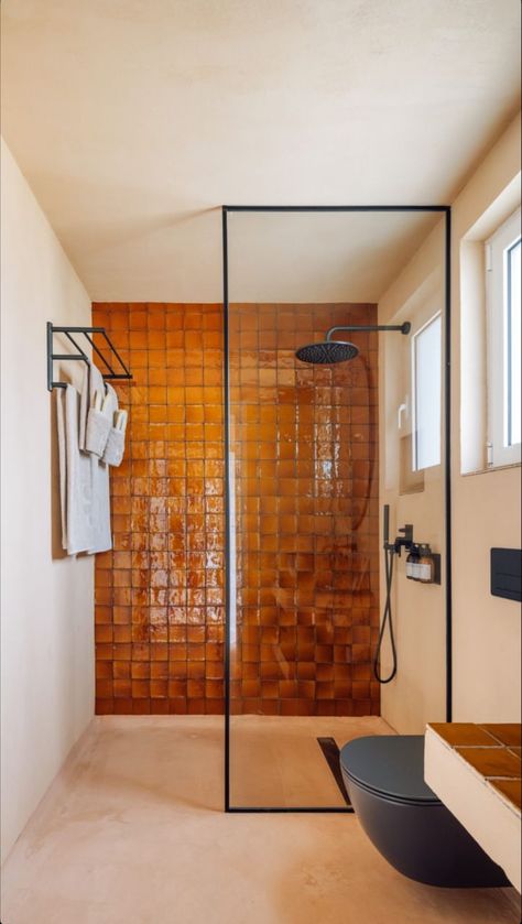 70s Modern Bathroom, Sunset Orange Bathroom, Maximalist Interior Design Bathroom, Burnt Sienna Bathroom, Orange Shower Tile, Terracotta Shower Floor, Burnt Orange Tile Bathroom, Midcentury Modern Master Bathrooms, Orange Marble Bathroom