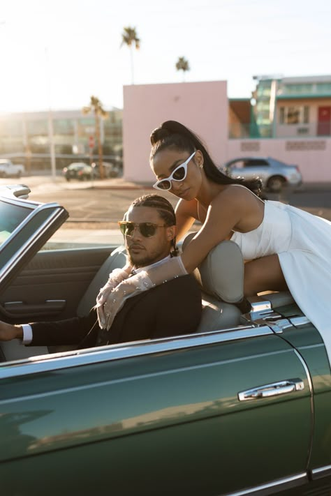 Downtown Phoenix offers an amazing canvas for your wedding memories! With Seguro Photo's Downtown Weddings Narrative Photography, our Arizona wedding photographer will help you paint your love story against the vibrant backdrop of Phoenix. Click to learn more! #blacklove #luvbridal #browngirlmagic #blackweddinghair #groominspiration #weddingdressinspo #weddingaccessories #classiccar Old School Car Photoshoot Black Couple, Corvette Photoshoot Couple, Low Rider Wedding Pictures, Couples In Cars Photography, Couples Maternity Photos, Downtown Phoenix Engagement Photos, Old School Wedding, Engagement Photos Miami, Engagement Photo Shoot Poses