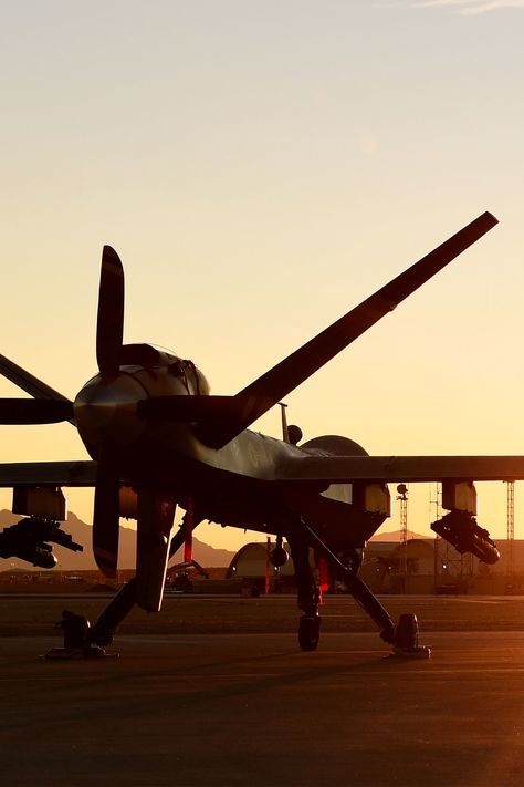 An MQ-9 Reaper sits on the flight line at Creech Air Force Base, Nevada, Dec. 17, 2019. The Remotely Piloted Aircraft enterprise is made of Airmen across all career fields to deliver justice to our Nation’s enemies 24/7/365. U.S. Air Force photo by Senior Airman Haley Stevens Mq9 Reaper, Air Force Wallpaper, Career Fields, Air Force Base, Air Force Bases, U S Air Force, 2025 Vision, Line At, Military Aircraft