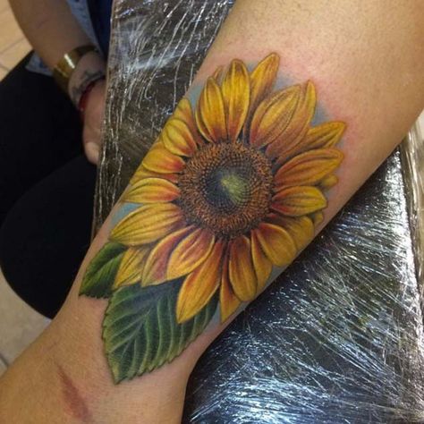 Sunflower Tattoo on Wrist by Danny Mateo Sunflower Tattoo On Wrist, Sunflower Tattoo Meaning, Sunflower Tattoo Thigh, Sunflower Tattoo Simple, Mujeres Tattoo, Sunflower Tattoo Sleeve, Sunflower Tattoo Shoulder, Harry Potter Tattoos, Disney Tattoo