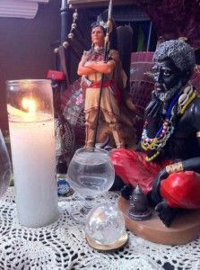 Statues depicting Indian and Congo spirits grace this simple bóveda along with a glass of water, crystal ball and a white candle. Ancestor Work, Sacred Space Altar, Orishas Yoruba, Hoodoo Conjure, Voodoo Hoodoo, African Traditions, Folk Magic, Indigenous Americans, French Quarter