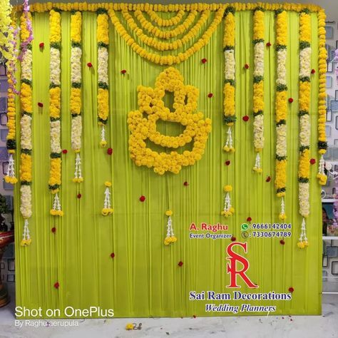 #pellikuthurufunction | Instagram Latest House Warming Decorations Indian, Satyanarayana Vratham Decoration Ideas, Diy Indian Backdrop Ideas, Housewarming Backdrop Ideas, Vratam Decoration Ideas, Vratham Decoration Satyanarayana, Simple Decoration For Engagement At Home, Pelli Kuthuru Decoration At Home, Wedding Stage Design Simple