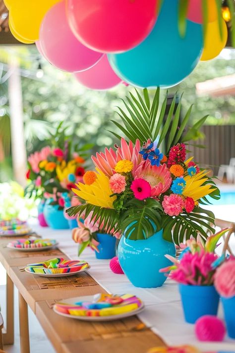 Unveil my favorite 6th birthday party ideas! Explore themes, games, and DIY decor for unforgettable celebrations your kid will love. Luau 3rd Birthday Party Ideas, 40th Birthday Tropical Theme, Summer Party Table Centerpieces, Polynesian Theme Party, 40th Pool Party Ideas, Luau Kids Birthday Party, Stitch Luau Birthday Party, Summer Bday Party Ideas, African Carnival