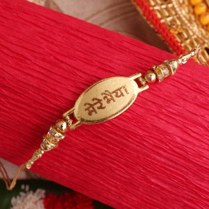 gold rakhi to gift this raksha bandhan Rakhi Gold Designs, Gold Rakhi Designs For Brother, Gold Rakhi, Rakhi For Kids, Braclets Gold, Silver Rakhi, Brother Gifts, Rakhi Online, Rakhi For Brother