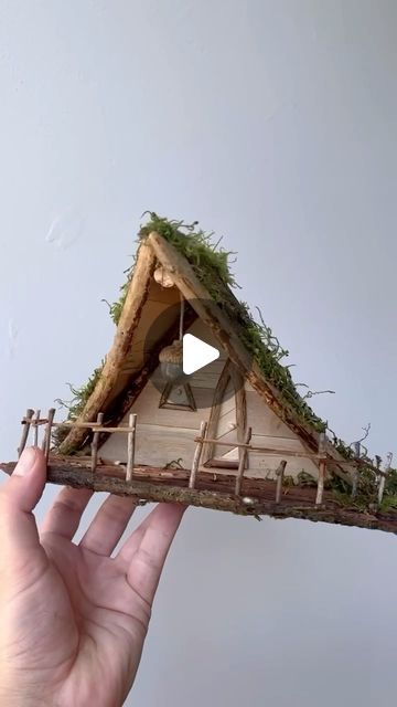 Maryinthefairyland on Instagram: "Fairy treehouse - built with natural materials. Full DIY video tutorial on my YouTube channel: https://youtu.be/IH3BNWs4lJU Materials used: craft sticks, branches, bark, moss, wood glue, hemp string You will find the craft sticks I used here: https://a.co/d/39I13kE & https://a.co/d/dgBJjns (Paid link) #fairytreehouse #fairyland #fairyvillage #fairyforest #whimsicalworld #enchantedforest #enchantedhouses #fairyhouse #fairyhouses #fairydwellings #fairytales #feenhaus #gnomehouse #gnomehome #pixiehouse #pixiehollow #pixiedwellings #hobbithouse #diyfairyhouse #wichtelhaus #miniatureart #naturecraft #naturecrafts #fairymagic" Craft Using Natural Materials, A Frame Fairy House, Diy Fairy Tree House, Driftwood Fairy House, Homemade Fairy Houses Diy, Nature Materials Craft, Fairy Tree Houses Diy, Fairy Castle Diy, Crafts With Tree Branches