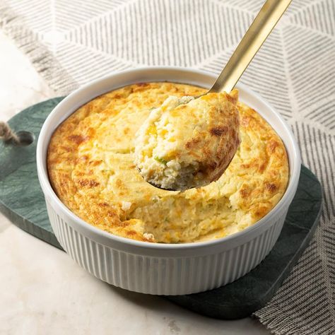 This potato souffle incorporates mashed potatoes and a blend of cheeses into light and airy goodness. A souffle is easier than you think to prepare—and sure to impress. Potato Souffle, Parmesan Mashed Potatoes, Sweet Potato Souffle, Parmesan Cheese Potatoes, Souffle Recipes, Jacque Pepin, Leftover Mashed Potatoes, Cheese Potatoes, Three Cheese