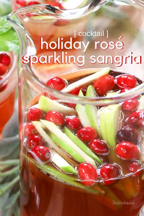 This sweet and festive holiday cocktail is a delicious and sweet Rosé Sangria. Celebrating the holidays just got a little easier with a holiday Sangria, you'll want to drink again and again. #cocktails #christmasrecipes Short Pointed Nails, Short Pointy Nails, Rosé Sangria, Holiday Party Drinks, Recipes Winter, Cocktail Rose, Holiday Sangria, Festive Holiday Cocktails, Frozen Drink Recipes