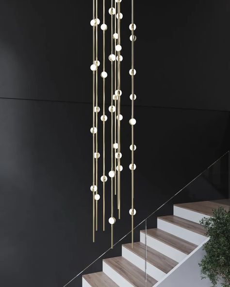 Welcome guests into your home with the stunning Raindrops Glass Staircase Chandelier. This chandelier features linear strands of varying lengths and LED hubs, providing a strong and customizable source of light for any room. With options for crystal facets or soft white lenses, you can unleash your artistic side and create the perfect ambiance for your space. Let your creativity shine with this beautiful and versatile lighting fixture. Voltage 110V-120V/ 220V-240V Material Metal , Acrylic Light Fixture Form Chandelier Style ‎Modern Light Source LED Bulb Included Or Not Yes Dimmable Yes Sloped Ceiling Adaptable Yes Light Direction Ambient Irradiation Area 10㎡-30㎡ Fixture Shape Constellation Indoor/Outdoor Usage Indoor Specific Uses Decoration Application Scenario Foyer/Staircase/High-ceilin Chandelier Hotel Lobby, Raindrop Chandelier Foyer, Blown Glass Chandelier Foyer, Stained Glass Chandelier Foyer, Blown Glass Chandelier Crystals, Foyer Staircase, Footstool Coffee Table, White Lenses, Glass Staircase