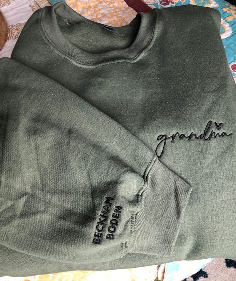 Excited to share the latest addition to my #etsy shop: Personalized Grandma,Custom Pocket and Sleeve Embroidered Sweatshirt,Embroidered Grandma Crewneck, Grandmother Sweatshirt with Kids Name https://etsy.me/3GolJgw #personalizedgrandma #embroidered #giftkidsnames Grandma Sweater, Personalized Grandma, Embroidered Crewneck, Personalized Clothes, Embroidered Sweatshirt, Embroidery Ideas, Embroidered Tshirt, Embroidered Sweatshirts, Fitted Sweater