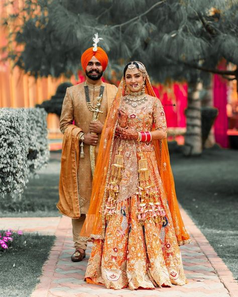 Groom Indian Wedding Outfits, Bride Groom Photoshoot, Punjabi Wedding Couple, Orange Lehenga, Sikh Bride, Wedding Orange, Wedding Dresses Men Indian, Shadi Dresses, Wedding Lehenga Designs