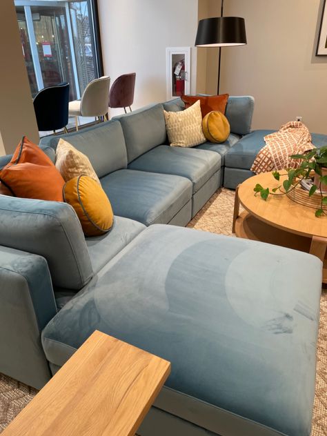 Light Blue Couch Decor, Pale Blue Couch Living Room, Light Blue Couch Living Room Decor, Light Blue Velvet Sofa Living Room, Styling A Blue Couch, Blue Couch Christmas Decor, Baby Blue Sofa Living Room, Light Blue Leather Couch, Dusty Blue Couch