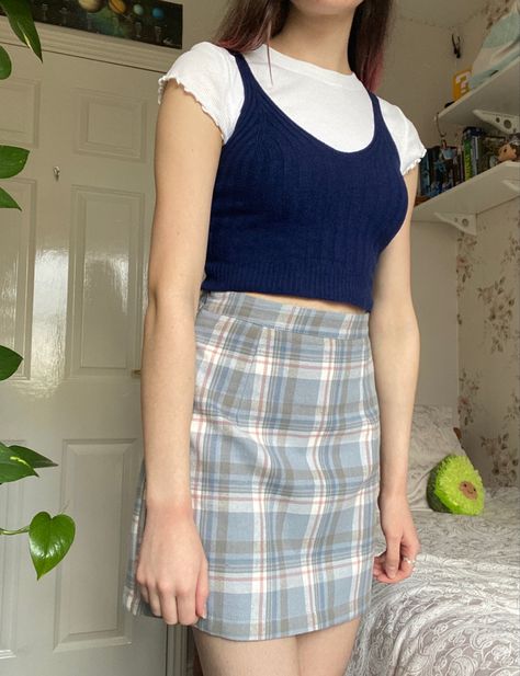 blue checkered skirt w/ blue tank top layered over a white t-shirt #90s #90sfashion #90saesthetic #blueskirt #spring2021 #springfashiontrends #aestheticoutfits Checkered Tank Top Outfit, Layering Tank Tops Outfits 90s, Tank Top Over Long Sleeve Outfit 90s, Tank Top Layered Over Shirt Outfit, Layer Tank Top Over Shirt Outfits, Layered Tank Top Outfits 90s, Layer Shirt Outfit, Tank Top Over Long Sleeve Outfit, Tank Top Over Long Sleeve