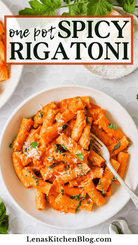 This spicy rigatoni is bursting with fiery flavors! Every forkful showcases the warmth of crushed red pepper, the richness of Parmesan and cream, and the tanginess of marinara. One Pot Spicy Rigatoni, Red Sauce Rigatoni, Creamy Spicy Rigatoni, Rigatoni Recipes Chicken, Spicy Rigatoni Pasta Recipe, Pasta Marinara Recipes, Creamy Rigatoni Recipes, Rigatoni Arrabiata, Spicy Red Sauce Pasta