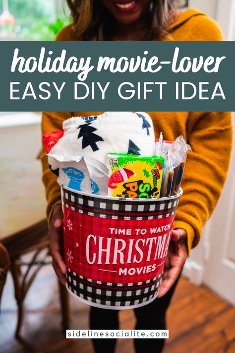 Discover the magic of movie nights with our DIY Movie Buff Gift Basket! Packed with cinema essentials, it's the perfect gift for the film enthusiast in your life. Ideal for birthdays, anniversaries, or just because! Movie Lover Gift Basket, Family Movie Night Gift Basket, Top 10 Christmas Movies, Family Movie Night Gift, Movie Basket, Movie Basket Gift, Movie Night Basket, Popcorn Buckets, Classic Holiday Movies