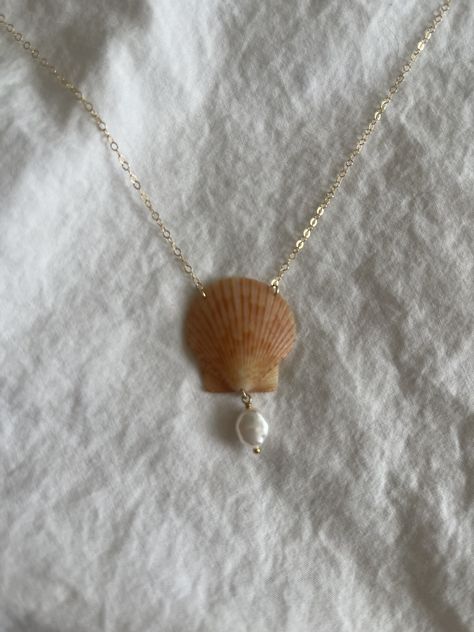 Scallop Shell Necklace / One-of-a-kind / 14k Gold Filled / Charm / Shells found directly in St.Pete! Length: -16.5" Materials: -14k gold-filled chain & findings -Scallop Shell -Faux Pearl Charm Closure: Spring ring clasp To keep jewelry from tarnishing quickly avoid wearing it in water or getting it wet. *This item is made to order, so processing time is needed to make each item. Check us out on instagram @maydejewelry to be up to date on sales, new arrivals, giveaways & more! Follow our Instagr Shell Beads Jewelry, Sea Accessories, Jewelry Mood Board, Dolphin Jewelry, Coquille Saint Jacques, Beachy Jewelry, Seashell Jewelry, Scallop Shell, Saint Jacques