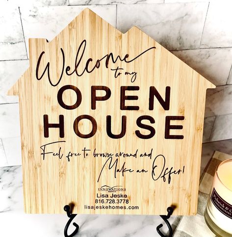 "Elevate your Real Estate marketing with a Realtor Open House Sign to add an inviting welcome for potential buyers and remind them you are ready for their offer!! Our eco-friendly bamboo 10in x 10in house shaped sign is laser engraved with the words \"Welcome to my Open House - feel free to browse around and Make an Offer!\" and includes your realtor logo  and information. Included is an 8.5 in foldable black iron stand. Please add in personalization drop down any realtor information i.e name, p