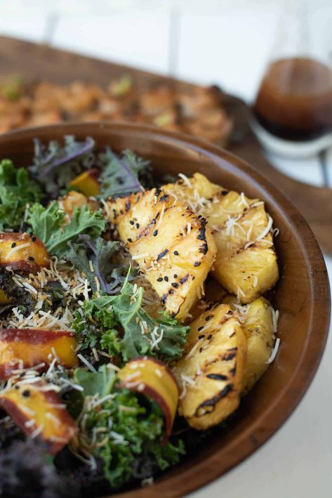 A delicious and fresh tasting Grilled Pineapple, Coconut and Kale Salad that will become your new summer favorite. Served with an Asian inspired dressing with flavors of soy sauce and toasted sesame oil, topped with toasted coconut. #pineapplesalad #kalesalad #vegansalad #pineapplekalesalad Grilled Pineapple Salad, Salad Pineapple, Coconut Kale, Pineapple Salad Recipes, Coconut Salad, Grilled Kale, Pineapple Sauce, Toasted Sesame Oil, Pineapple Salad