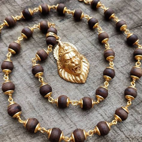 5 micron thick pure Gold plated sterling silver Nrsimha capped Tulasi Mala! We use a very high standard of gold plating to lay as long as possible.
#goldenlion #handmadejewelry #tulasimala #darkwood #narasimha Rudraksha Locket For Men, Men Ornaments, Gold Mala, Tulsi Mala, Mens Bracelet Gold Jewelry, Rudraksha Jewelry, Man Gold Bracelet Design, Doctor Birthday, Golden Rings