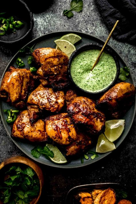 Peruvian Grilled Chicken with Creamy Green Sauce is packed with flavor and the perfect way to add some international flair to your next barbecue. // peruvian chicken // grilled chicken #grilledchicken #bbqchicken #bbqrecipe Chicken With Green Sauce, Creamy Green Sauce, Peruvian Chicken Recipe, Green Sauce Recipe, Peruvian Chicken, Summer Meal, Peruvian Recipes, Green Sauce, Chicken Dishes Recipes