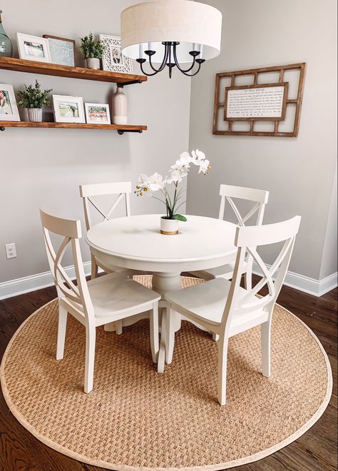 White round kitchen table with four chairs Small White Kitchen Table, Apartment Decor Dining Area, Kitchen Table Apartment Ideas, Small White Kitchen Table And Chairs, White Round Dining Table Decor, Small Kitchen Ideas Table, Small Round Farmhouse Kitchen Table, Apartment Kitchen Table Ideas, Farmhouse Kitchen Table Circle