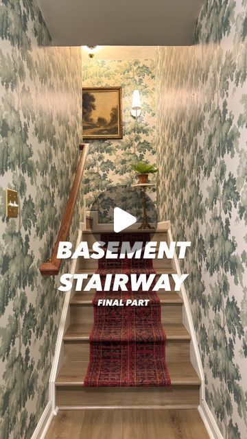 CASS SMITH | Home & DIY on Instagram: "✨BASEMENT STAIRWAY REVEAL✨

Can’t believe this is the same space. It’s like it was always meant to be like this ❤️

Flooring : @califloors Golden Hour Oak
Wallpaper : Raphael - Green by @sandbergwallpaper" Basement Stairwell Decor, Stairway Renovation, Stairway Wallpaper, Oak Wallpaper, Staircase Wallpaper, Basement Stairway, Basement Stairwell, Basement Staircase, Basement Stairs Ideas