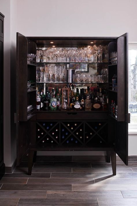 A freestanding alcohol cupboard with glasses, wine racks and of course, alcohol. A great home bar. Cupboard Bar, Contemporary Kitchens, Gin Bar, Wine Racks, Wine Storage, Contemporary Kitchen, Home Bar, Of Course, Living Room Kitchen