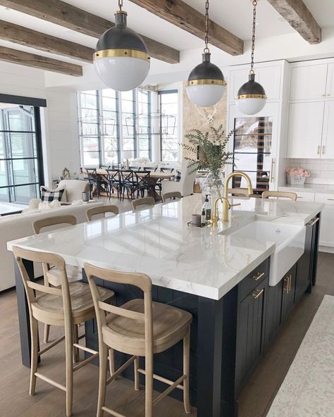 H O M E // Waking up to this beaut of a kitchen is an absolute dream!🥰 I legit, still pinch myself!🙋🏻‍♀️ I receive SO many questions about… Farm Sink Island, Homey Kitchen Modern, White Kitchen With Big Island, No Dining Room House Plans, Cabinets.com Kitchens, Large Dome Pendant Lights Over Kitchen Island, Timeless Farmhouse Style, Kitchens With Blue Islands And White Cabinets, Wide Island Kitchen