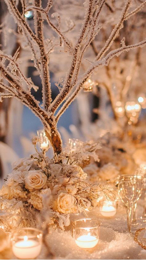 Elegant winter wedding setup with frosty decor and cozy, candlelit ambiance, creating a magical December wedding atmosphere. Winter Wonderland Wedding Simple, Winter Decor Wedding, Winter Wedding Welcome Table, Winter Wonderland Wedding Ceremony, Candle Themed Wedding, White Branches Decor Winter Decorations, Winter Themed Wedding Centerpieces, Dramatic Wedding Decor, Nutcracker Wedding Theme