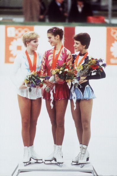 Figure Skating: 1984 Winter Olympics: (L-R) USA Rosalyn Sumners (silver), East Germany Karatina Witt (gold), and Soviet Union Kira Ivanova (bronze) victorious on medal stand after Women's Singles Finals at Olympic Hall Zetra. Sarajevo, Yugoslavia 2/18/1984 CREDIT: Manny Millan (Photo by Manny Millan /Sports Illustrated/Getty Images) (Set Number: X29597 ) Katharina Witt, 1984 Winter Olympics, Medal Stand, Nye 2023, Katarina Witt, Sporty Women, Figure Skaters, Winter Festival, Olympic Champion