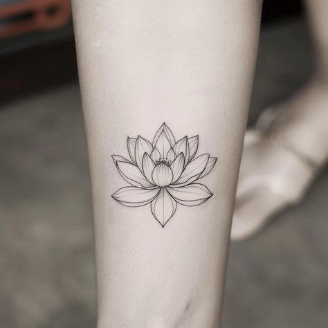 Discover the allure of a freshly inked lotus tattoo, symbolizing purity and rebirth, gracefully adorning a forearm. Let this meaningful art inspire you. Save & follow for more ink inspiration. In this close-up, each petal unfolds with depth, crafted with stunning detail, inviting a sense of inner peace and renewal. 🌸✨ #TattooArt #LotusTattoo #InkInspiration #BodyArt #SpiritualSymbol #AIimage Negative Space Lotus Tattoo, Lotus Flower Tattoo Aesthetic, Forearm Lotus Tattoo, Buddhist Lotus Tattoo, Lotus Flower Tattoo On Neck, Open Lotus Flower Tattoo, Lotus Tattoo Neck, Lutos Tattoo Design, Abstract Lotus Tattoo