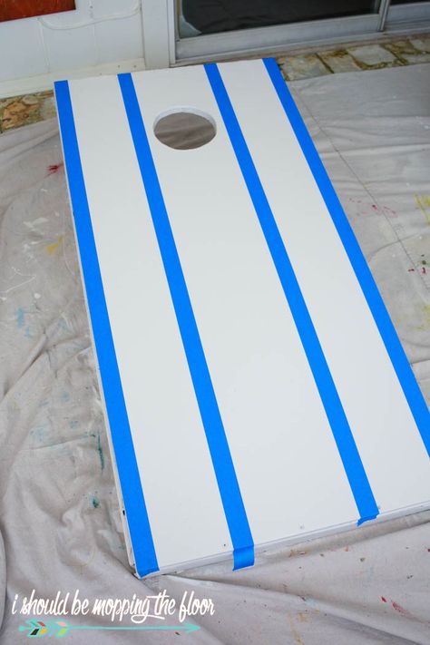 Painting Cornhole Boards | Revamp your plain Cornhole boards with this simple painting technique. Painting Cornhole Boards, Diy Cornhole Bags, Painted Corn Hole Boards, Diy Cornhole Boards, Cornhole Boards Designs, Ideas For Painting, Diy Yard Games, Corn Hole Diy, Cornhole Designs